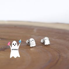 These little ghosty earrings are perfect for Halloween! 👻 Congratulations, Ghost Hunter! You've successfully uncovered the hidden specter on our website, and your reward is 20% off your next purchase! Use code SPOOKY23 at checkout to claim your well-earned discount. But beware, as the ghostly magic fades with the dawn after All Hallows Eve, so make sure to put this enchanting code to use before then. Happy shopping, and may your Halloween be filled with spooky delights! 🎃🌕 .925 Sterling Silve Spooky Nickel-free Silver Earrings, Spooky Silver Nickel-free Earrings, Spooky Silver Pierced Earrings, Handmade Sterling Silver Halloween Earrings, Silver Spooky Halloween Earrings, Spooky Silver Earrings For Gift, Silver Earrings For Halloween Gift, Spooky Nickel-free Jewelry For Gifts, Spooky Nickel-free Jewelry Gift