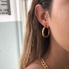 The Boomerang Earrings are a classic thicker style hoop perfect for everyday wear. Materials: 14K Gold Plated Brass Silver Plated Brass Hypoallergenic and Nickel FreeSize:Available in two sizes: M Diameter: 2.9cm / 1.1"L Diameter: 3.6cm / 1.4"Hoop thickness: 0.4cm / 0.15This item comes with a one-year warranty.Greeting card and/or gift receipt for exchange is available with purchase at checkout. Classic Everyday Metal Earrings, Classic Metal Earrings For Everyday, Classic Metal Hoop Earrings For Everyday, Classic Metal Huggie Earrings For Everyday, Classic Everyday Gold Plated Hoop Earrings, Everyday Round Gold-plated Hoop Earrings, Everyday Metal Earrings, Everyday Gold Plated Hoop Earrings, Everyday Round Gold Plated Hoop Earrings