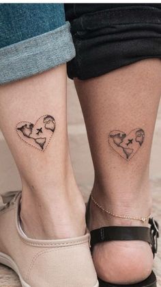 two people with matching tattoos on their legs