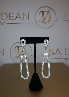 These silver crystal earrings have a thin teardrop design. These have a post backing. Perfect for gown! Nickel/Lead Free Silver Crystal Earrings, Crystal Teardrop Earrings, Romper And Jacket, End Of Season Sale, Blazer With Jeans, Silver Crystal, Accessories Jewelry Earrings, White Maxi Dresses, Women Set