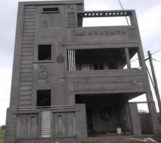 an apartment building with multiple balconies on the top floor and two stories above it