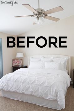 a white bed sitting in a bedroom under a ceiling fan with the words before written on it