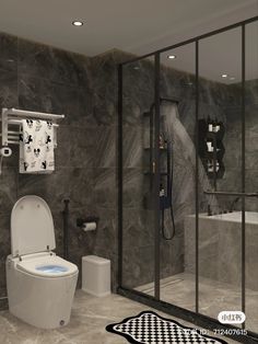 a bathroom with black and white checkered rugs on the floor, shower curtain, toilet