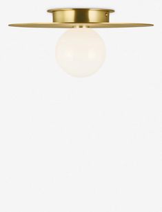 a light that is on top of a white wall with a gold plated ceiling fixture