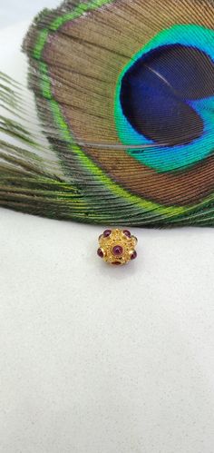 Thank you for riching to our shop! The beautiful handmade ball bead is the perfect finding for DIY jewelry making and can be used in multiple different ways and designs. Country of Manufacture: India Metal: Gold Size: 9 MM Metal Purity: 18K Color: Yellow Shape: Ball Stone: Hydro Red Hole Size: 2 MM Item Number: KC2026 This influential product belongs to our 18k gold Charm ball beads collection. Primarily manufactured in INDIA, this necklace or bracelet gold ball bead has entirely made of solid y Elegant Gemstone Beads In Gold, Festive Yellow Gold Bracelets With Round Beads, Traditional Red Jewelry With Tiny Beads, Spiritual Jewelry With Tiny Round Beads, Red Ruby Beads For Gifts, Elegant Round Spacer Beads, Festive Gold Jewelry With Tiny Beads, Ceremonial Red Gemstone Jewelry, Red Rondelle Spacer Beads Jewelry