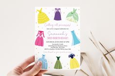 a person holding up a card with princess dresses on it and the words, birthday