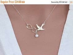 ON SALE Silver Infinity Bird Necklace, Friendship Necklace, Mother Necklace, Mother of the Bride or Groom Jewelry, Wedding Gift, Jewelry Car by rainbowearring on Etsy https://www.etsy.com/listing/179012659/on-sale-silver-infinity-bird-necklace White Infinity Jewelry For Gifts, White Infinity Jewelry Gift, White Infinity-shaped Jewelry Gift, White Infinity Jewelry For Mother's Day, Groom Jewelry, Necklace Friendship, Mother Necklace, Friendship Necklace, Friendship Necklaces