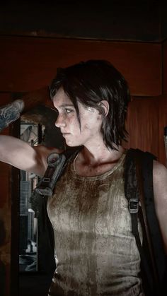 the last of us's character is holding her arm out and looking at something