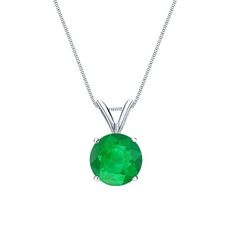 This elegant solitaire pendant necklace come set in 18k white gold metal with a 4-prong basket setting and breathtaking Green Emerald round-cut gemstone with a total weight of 0.62 ct. The pendant comes with a matching 18-inch box chain that secures with a spring ring clasp. Black Diamond Pendant, Emerald Necklace Pendant, Black Diamond Studs, Halo Diamond Earrings, Solitaire Diamond Pendant, Colored Diamond Rings, Emerald Earrings Studs, Mesmerizing Beauty, Basket Setting