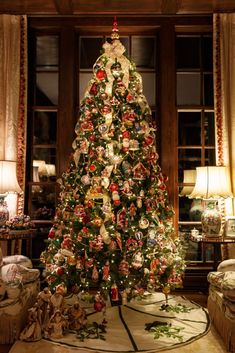 a decorated christmas tree in a living room