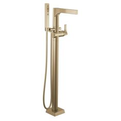 the shower faucet is shown in brushed brass