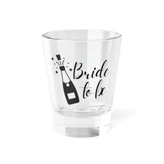 a shot glass that says bride to be