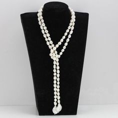 ******ON SALE******The necklace is made of 9mm white color freshwater nugget pearls and 16-19mm white baroque pearlsItem No: NK481Material: freshwater pearlsShape:nugget shape and baroque shapeSize: 9mm and 16-19mm Color: whiteLuster: goodSkin: with flawsQuality: ABead:silver 925Hand Knotted: YesNecklace length: 55inch,any other length you needPacking: beautiful gift pouch,ready for gift givingIf you need other specific length according to your personal situation,please contact me freely, i will Cheap Adjustable White Long Necklace, Affordable Long Pearl Necklace, White Baroque Pearl Lariat Necklace, White Pearl Lariat Necklace, White Lariat Pearl Necklace With Pearl Drop, White Pearl Drop Lariat Necklace, How To Wear Pearls, Pearl Lariat Necklace, Pearl Lariat