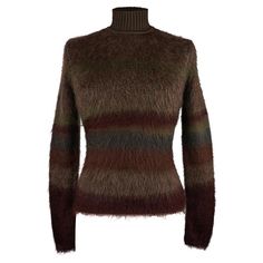 Mightychic offers an Hermes Sweater featured in jacquard knit striped earth tones. Brushed mohair blended with wool, silk and cashmere. Exterior is brushed mohair and silk. The interior is wool and cashmere knit. Mock Turtle neck is silk rib trim. Made in Italy NEW or NEVER WORN. final sale SIZE 36 USA SIZE 4 BAG MEASURES: LENGTH 22.5" WAIST 13.5" HIP 15.5" SLEEVE 25" SHOULDER 14.5" UNDERARM to UNDERARM 15.5" CONDITION: NEW or NEVER WORN Hermes Sweater, Brushed Mohair, Sweater Striped, Mock Turtle, Mohair Wool, Jacquard Knit, Mock Turtleneck, Earth Tones, Sweater Outfits