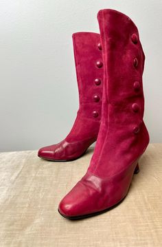 These are so fun! Enzo Angiolini boots from the later 1990's. They are obviously inspired by the Victorian era. These could be really fun with the right outfit! A great pop of color! They show very subtle and average signs of wear. Suede & leather with sweet little covered buttons up the side.  A darker magenta like pink, leaning towards burgundy, but still very pink. or Mauve perhaps.  Size 8M. tone on tone, leather & suede. Please look over footbed measurements below as, sizing may run a half Retro High-top Boots For Fall, Leather Boots With Button Closure And Round Toe, Retro High Ankle Boots For Fall, Retro High-top Winter Boots, Retro Ankle Boots For Winter, Retro Round Toe Mid-calf Boots For Winter, Winter Leather Boots With Buttons, Vintage Fitted Boots With Almond Toe, Vintage Leather Boots With Buttons