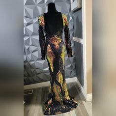 This Beautiful Sequins Gown Is Definitely A Show Stopper. Multicolor Long Sleeve Gown For Party, Long Sleeve Multicolor Gown For Party, Multicolor Fitted Evening Dress For Gala, Fitted Multicolor Evening Dress For Gala, Glamorous Fitted Multicolor Evening Dress, Multicolor Fitted Evening Dress For Formal Occasions, Multicolor Fitted Gala Gown, Multicolor Fitted Gown For Gala, Fitted Multicolor Evening Dress For Formal Occasions