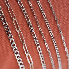 "Silver Chain Necklace * Cable Chain * Paperclip * Twist Chain * Figaro Chain * Curb Chain * Dainty Chain * Gift for Kids * Christmas Gift * Size & Material & Other Details ∙ Material of the necklaces; Stainless Steel *TARNISH FREE  *WATERPROOF *HYPOALLERGENIC ∙ Available Length: 14\" - 16\" - 18\" - 20\" - 22\" - 24\" - 26\" * Elegant ∙ Gift ∙ Wrapping ∙ Option ∙ We can add your personalized notes inside both regular and gift wrap packaging. Fill out the \"Gift Message\" section with your speci Silver Link Chain Necklace For Gift, Silver Chain Paperclip Necklace For Gift, Silver Tarnish-resistant Chain Necklace For Gift, Nickel-free Dangle Chain Necklace For Gift, Sterling Silver Chain Ring, Tarnish Resistant, Gift, Wrap Packaging, Elegant Gift Wrapping, Figaro Chains, Dainty Chain