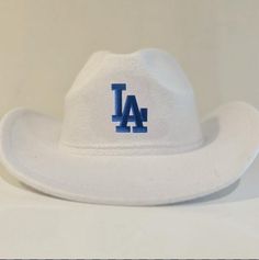 LA Dodgers Cowboy Hat Product details: Fabric type: 65% cotton ,35% polyester Care instructions: Hand Wash Only One Size Fit Most People: The hat head measurement: from 22" to 23.2" (57-59cm). Blue Hat La, Brown Dodgers Hat, Dodgers Fitted Hat, La Dodgers Hat, Dodgers Gear, Chapeau Cowboy, Cowboy Hat, Trucker Cap, Cowboy Hats