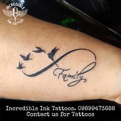 a tattoo with the word family written in cursive writing and birds flying around it