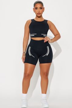 Available In Black. Active Top Scoop Neck Sleeveless Padded Cropped Active Biker Short High Waisted, Elastic Waistband Elevate Reflective Detail High Performance Stretch Body: 73% Polyester 27% Spandex Inner Mesh: 82% Nylon 18% Spandex Imported | Sprint Reflective Elevate Active Set in Black size XS by Fashion Nova Black Seamless Tank Activewear, Black Sporty Seamless Tank Top, Black Compression Tank Top With Built-in Bra, High Stretch Black Tank Sports Bra, Black Compressive Racerback Top, Black Compressive Sportswear Tank Top, Compressive Black Sportswear Tank Top, Black Tank Sports Bra For Athleisure, Black Compressive Tank Top Athleisure