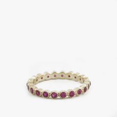 Gold Eternity ring set with Beautiful Pink Rubies. Famous for its passionate Pink-Red Color this July birthstone gemstone in one of finest and most sought after gemstones. Elegantly Set in a crown settings, Each ruby is 2mm in diameter with excellent color and clarity. This graceful Eternity ring has a dainty poise about it, getting lots of the right attention every time you wear it on its own or stack it with your other rings! Featuring between 15-22 Gemstones(Depending on ring size). Other sto Formal Multi-stone Pink Ruby Ring, Formal Pink Multi-stone Ruby Ring, Ruby Eternity Band As A Gift, Fine Jewelry Style, Pink Ruby Rings With Multi-stone Detail, 14k Gold Ruby Birthstone Ring, Fine Jewelry, Gold Eternity Ring, Eternity Ring Set, Eternity Ring Gold, Pink Ruby