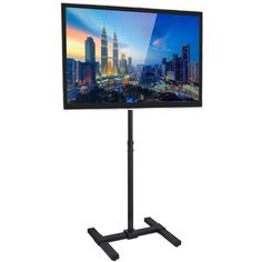 This TV stand features adjustable feet that allow easy leveling on uneven floors, commonly found in restaurants, trade shows, malls, and pubs. The mounting brackets fit VESA 200mm x 200mm and smaller, and is designed to hold screens 13" to 42" with a maximum weight of 44 lbs. The mounting bracket allows for 30 screen tilt upwards to maximize viewing angles. The total cart height reaches 52" with a base width of 20." Outdoor Television, Portable Tv Stand, Mobile Tv Stand, Tv Floor Stand, Swivel Tv Stand, Swivel Tv, Portable Tv, Photos Booth, Tv Display