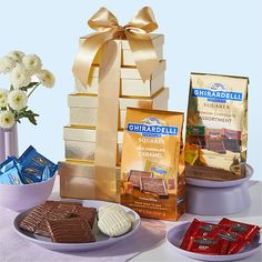 chocolates, crackers and candy are arranged on a table