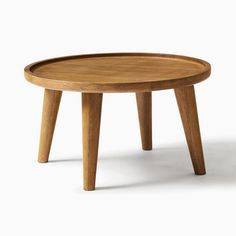 a wooden table with two legs and a tray on the top that is shaped like an oval