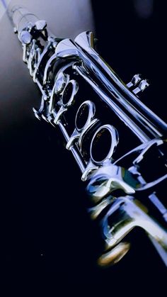 an image of a flute with the word god written on it's front end