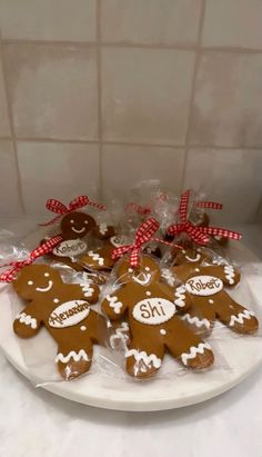 several gingerbread cookies on a white plate