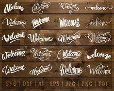 wooden wall with different types of welcome signs on it and the words welcome written in cursive writing