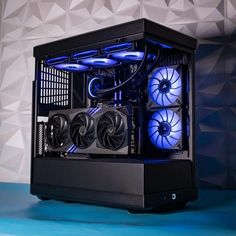 a computer case sitting on top of a blue floor