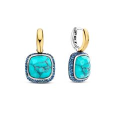 Description Stunning yellow gold-plated earrings showcase a vibrant turquoise cushion stone handset in a luxurious dark blue pave setting. A harmonious blend of sleek geometry and vibrant colours, these funky square shapes earrings combine modern sophistication with timeless elegance. Specifications Material: Sterling Silver, Gold Plated Stone: Turquoise Length: 2.4cm Hypoallergenic and Nickle-free Product Code: 7968TQ Turquoise Cushions, Pearl Jewelry Gift, Gold Rings Stackable, Jewelry Bracelets Gold, Gold Rings Fashion, Luxury Earrings, Halo Earrings, Gold Jewelry Earrings, Gold Fashion Necklace