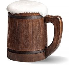 a wooden beer mug with white foam on top