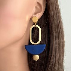 "Big Bold Statement Earrings, Minimalist style earrings, Matte Gold Earrings Ultra modern earrings, clean cut design to complement any outfit. Very Light weight. Materials: Gold plated brass, Rubberized acrylic bead. Size: Style A 2.6\" long, Style B 3\" long Your purchase comes in a beautiful box that is ready to give as a gift or to keep for yourself. **Want a custom design? Just ask! The custom made jewelry is sure to make the owner feel like a super star. We love mixing finishes. **Please be Geometric Earrings Minimalist, Modern Linear Drop Earrings For Jewelry Making, Blue Metal Earrings For Everyday Wear, Everyday Blue Metal Earrings, Modern Blue Metal Earrings, Minimalist Blue Earrings With Ear Wire, Blue Drop Earrings For Everyday Wear, Everyday Blue Drop Earrings, Modern Blue Earrings For Everyday