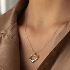 14K Real Gold Frame Heart Shape Pendant Necklace Love Valentine's Day Christmas Dainty Gift for Women Handmade Minimalist Design Elegance ⓂMaterials & Specifications : Necklace Chain Lengths : 42 cm (16.5 in) 44 cm (17.3 in) 46 cm (18.1 in) 48 cm (18.8 in) 50 cm (19.6 in) Frame Heart Pendant Width : 1.6 cm (0.39 in) Frame Heart Pendant Length : 1.5 cm (0.62 in) Delicate Heart Necklace With Clavicle Chain For Valentine's Day, Elegant Heart-shaped Christmas Necklaces, Elegant Heart-shaped Christmas Jewelry, Elegant Heart-shaped Christmas Necklace, Valentine's Day Open Heart Clavicle Chain Necklace, Open Heart Necklace For Valentine's Day Gift, Valentine's Day Gift Open Heart Necklace, Tiny Elephant, Beautiful Gold Necklaces