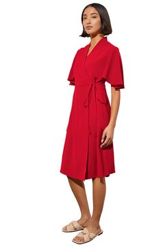 A wrap waistline accentuates your figure in a butterfly-sleeve dress crafted from airy crêpe de Chine. 38" length Surplice V-neck Short sleeves 100% polyester Machine or hand wash, dry flat Imported Elegant Viscose Wrap Dress With Surplice Neckline, Summer Wrap Dress With Draped Sleeves, Elegant Red Wrap Dress For Spring, Chic Wrap Dress With Tie Waist And Flutter Sleeves, Summer Evening Wrap Dress With Draped Sleeves, Elegant Red Midi Dress With Draped Sleeves, Elegant Crepe Midi Dress With V-neck, Elegant Crepe V-neck Midi Dress, Evening Wrap Dress With Tie Waist And V-neck