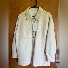 White Oversized Leather Jacket, Size Small. New With Tags. Oversized Leather Jacket For Workwear In Spring, Cream Shacket For Everyday, Oversized White Shacket For Spring, Trendy White Shacket For Workwear, Chic White Shacket For Workwear, Classic Oversized Leather Jacket For Spring, White Leather Jacket With Pockets For Work, Classic Cream Long Sleeve Leather Jacket, Short Cream Leather Jacket