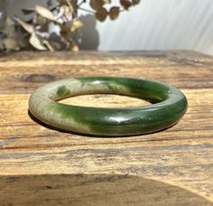 Round Jade was made for baby bangles, but the quality is too low to give to a baby. Do not give this to a baby. Please use it for jewelry-making Measures approximately 37mm Sold Individually Adjustable Round Band Bracelet For Gift, Stackable Bracelets As Gift, Stackable Round Band Bracelets As Gift, Handmade Spiritual Round Bangle, Handmade Green Round Cuff Bracelet, Adjustable Round Spiritual Bangle, Adjustable Round Green Cuff Bracelet, Handmade Round Jade Bangle, Adjustable Green Bangle