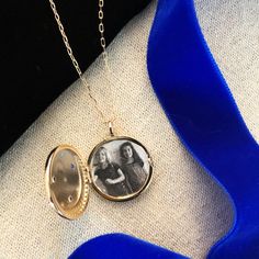 A starry night sky locket with a crescent moon and stars keeps a treasured photo inside. The back is inscribed "you are magic". This is truly a magical gift or keepsake. The locket is 7/8" in diameter and on a 17 1/2" long chain with a 3 1/2" extension. All orders over $50 ship for free within the USA. All orders usually ship within 24 hours. Spiritual Medallion Locket Necklace For Anniversary, Spiritual Round Locket Necklace For Anniversary, Anniversary Spiritual Medallion Locket Necklace, Birthstone Medallion Locket Necklace As A Gift, Round Pendant Locket Necklace With Charms For Keepsake, Anniversary Spiritual Round Locket Necklace, Round Locket Necklace With Charms For Anniversary, Anniversary Round Locket Necklace With Charms, Medallion Locket Necklace With Birthstone For Gift