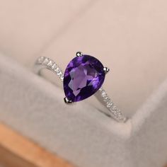 Fine Jewelry Teardrop Purple Ring, Fine Jewelry Purple Teardrop Ring, Purple Teardrop Fine Jewelry Ring, Elegant Pear-shaped Amethyst Promise Ring, Purple Pear-shaped Ring With Prong Setting, Formal Amethyst Pear-shaped Ring, Teardrop Amethyst Ring For Anniversary, Purple Teardrop Amethyst Ring For Anniversary, Purple Amethyst Teardrop Ring