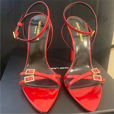 Red Heels Saint Laurent New In Box Size 5.5 Heels Saint Laurent, Red Square Toe Heels With 4-inch Heel, Red Saint Laurent Heels, Saint Laurent Heels, Red Heels With 4-inch Open Heel, Red Luxury Sandals With 4-inch Heel, Glamorous Red Heels With 4-inch Heel, Red Heels, Saint Laurent Shoes