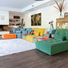 a living room filled with lots of colorful furniture