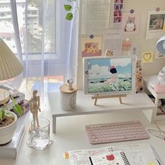 a desktop computer sitting on top of a white desk