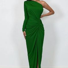 Step Into The Spotlight With The Zena Evening Dress, An Elegant One-Shoulder Maxi Dress Designed To Make A Statement. Featuring A Sophisticated Ruched Waist Detail And A Daring Front Slit, This Bold Green Gown Is Perfect For Formal Events, Parties, Or Special Occasions. The Soft, Form-Fitting Fabric Enhances Your Figure While The Single Sleeve Adds A Modern Touch. Brand New And Never Worn, This Dress Exudes Confidence And Glamour! Available Colors: Emerald Maxi Dress Designs, Green Gown, Emerald Color, Evening Dresses Elegant, Playing Dress Up, Formal Event, Evening Dress, Designer Dresses, Evening Dresses