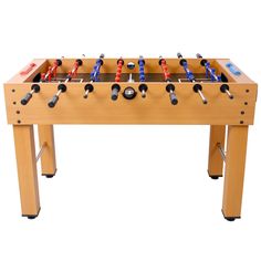 a wooden foosball table with several different colored foosballs