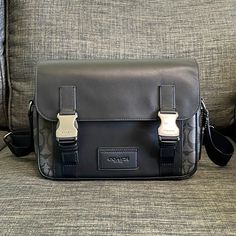 Smooth Calf Leather And Signature Coated Canvas Inside Multifunction Pockets Zip And Speedclip Closures, Fabric Lining Outside Slip Pocket Adjustable Strap With 25" Drop For Shoulder Or Crossbody Wear 10 1/2" (L) X 7" (H) X 2 1/2" (W) Style No. C3747 Gray Business Bags With Silver-tone Hardware, Designer Gray Shoulder Bag For Business, Coach Black Business Shoulder Bag, Coach Black Shoulder Bag For Business, Black Functional Coach Shoulder Bag, Coach Sling Bag Men, Coach Sling Bag, Coach Sling, Sling Bag Men