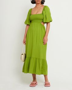 Price Comparison Few Moda $69 Reformation $208 Something Navy $258 Product Details The easy smocked bodice of this breezy style is elevated by the cut-out detail. Finished with relaxed puff sleeves and a flowy, tiered skirt.- Pockets- Lined- Content: 40% Linen, 60% Viscose Style# T21WDR00315 Fit Notes - Model wearing a size M- Shoulder seam to hem measures approx 51'' in length - Model measurements: Height: 5'10" Bust: 36" Waist: 26" Hips: 36" Breezy Style, Midi Dress Green, Something Navy, Skirt Pockets, Green Midi Dress, Dress Shapes, Price Comparison, Tier Skirt, Tiered Skirt