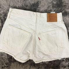 Never Worn! In Great Condition, They Just Don’t Fit Me Anymore, They Do Run Small. Vintage White Jean Shorts For Spring, Cheap White Levi's Jean Shorts, White Levi's Jean Shorts, Vintage White Jean Shorts, Levi's White Jeans With Pockets, White Levi's Shorts With Pockets, Levi's White Cutoff Jean Shorts, White Cotton Vintage Jean Shorts, Vintage White Cotton Jean Shorts