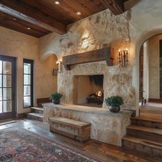 a stone fireplace in the middle of a room